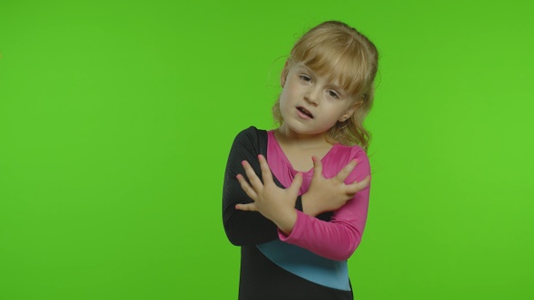 Child Ballerina Exercising in Studio on Chroma Key Background. Girl Kid Dancing, Making Gymnastics