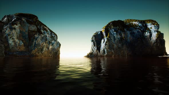 Rocky Cliff at Cold Sea Water