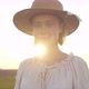 Front View of young Blonde Girl is walking in Sunny Day on Field, Village. - VideoHive Item for Sale