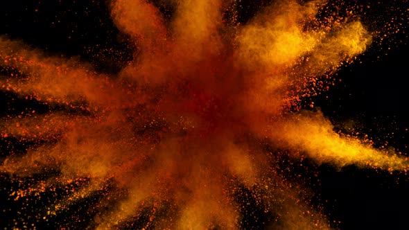 Super Slowmotion Shot of Orange Powder Explosion Isolated on Black Background at 1000Fps