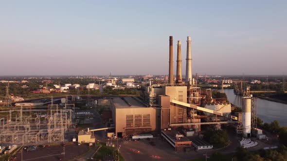 DTE River Rouge Power Plant At Belanger Park In Detroit, Michigan On A Sunrise - drone pullback