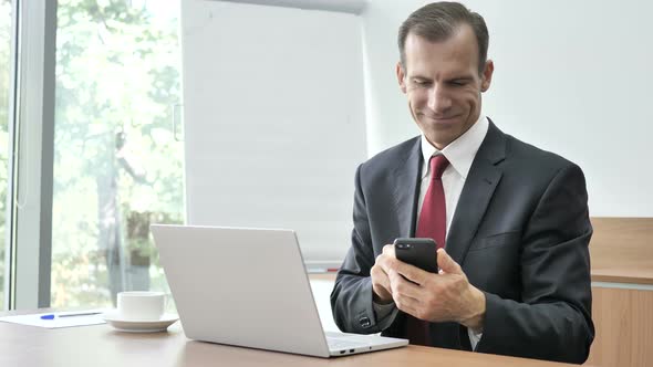 Businessman Using Smartphone