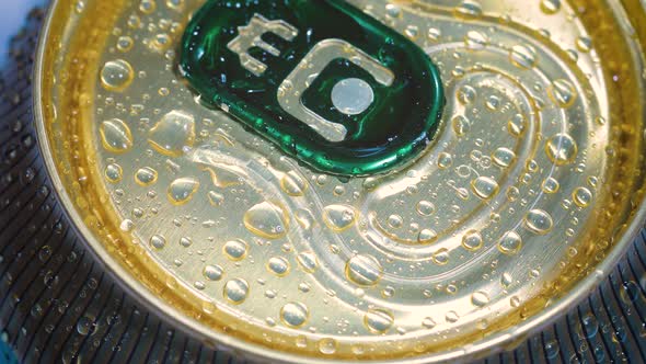 Aluminum Soda Tin Can Lid Cover of Soft Drink on Ice Goes Around the Circle