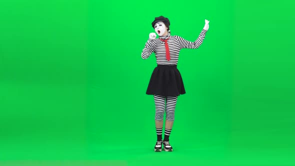 Mime Woman Singing Song and Gesticulating