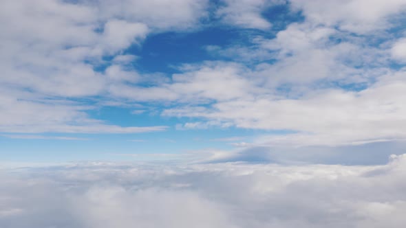 View From the Window of the Plane at the Clouds - Fly Among the Clouds