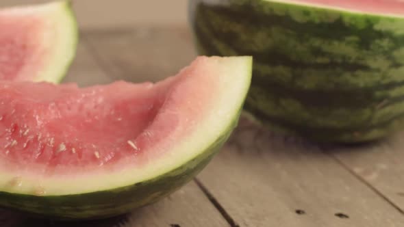 Juicy ripe watermelon panning shot close up