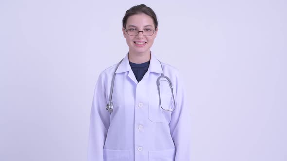 Happy Young Beautiful Woman Doctor Smiling