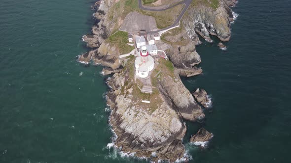 Aerial View Of Bailey Lighthouse With Keepers House On Peninsula At Howth, Dublin, Ireland.