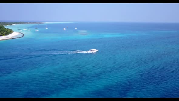 Aerial view landscape of tropical bay beach break by blue sea with white sandy background of adventu