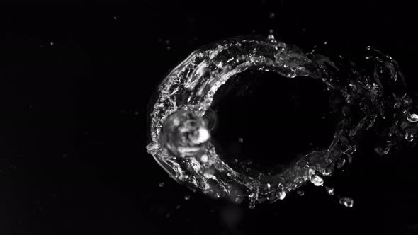 Super Slow Motion Shot of Splashing Water on Black Background at 1000Fps.