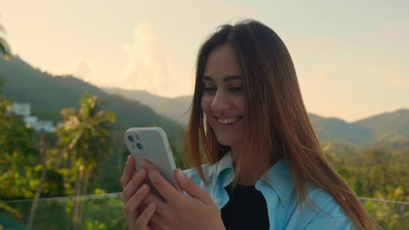 Smiling Caucasian Young Woman Sending Message on Smartphone Positive Trendy Hipster Girl Blogging in