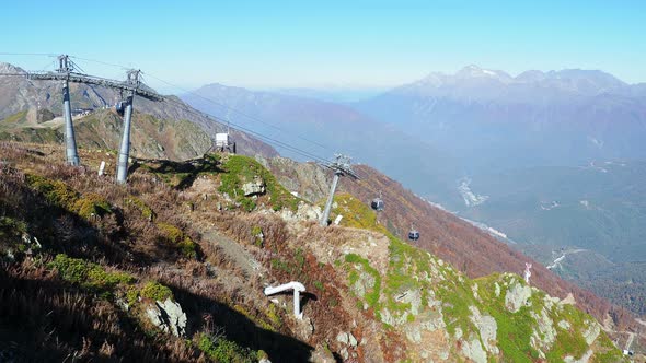 Moving Cabins of the Cable Road. Funicular with Words Rosa Khutor on Cabins. Russia.