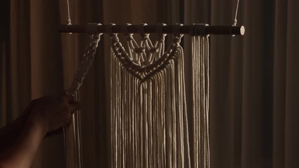 Woman Weaves Pattern of Macrame Threads with Her Own Hands for Decoration or Home Decor