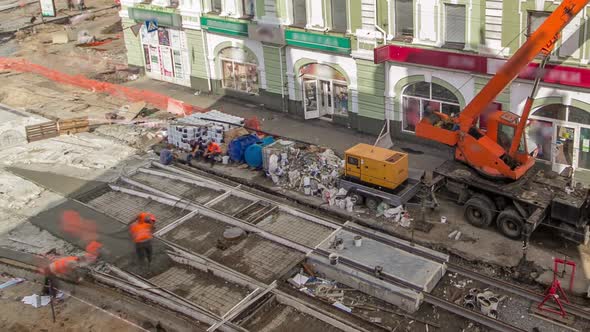 Concrete Works for Road Construction with Many Workers and Mixer Timelapse