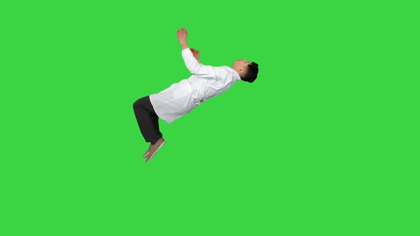 Young Doctor Does Back Flip Victory! on a Green Screen, Chroma Key