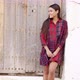 Young Woman in Trendy Outfit Standing Near Vintage Wall and Looking at Camera - VideoHive Item for Sale