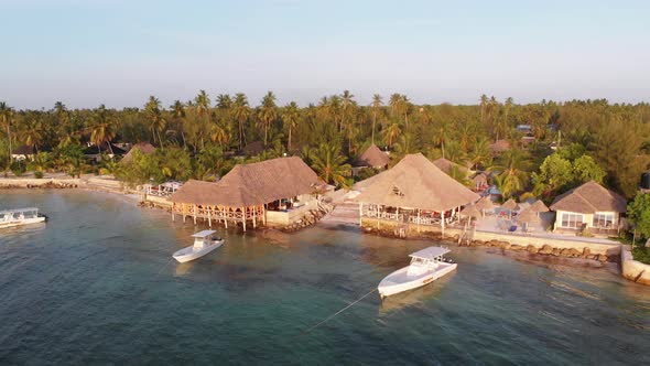 Paradise Beach Resort with Palm Trees and Hotels By Ocean Zanzibar Aerial View