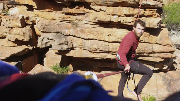 Highline athlete balancing on slackline rope