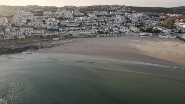 Praia da Luz, Algarve coastline, near Lagos. Idyllic sand beach. Aerial establisher