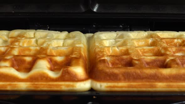 Preparation of waffles in waffle iron.