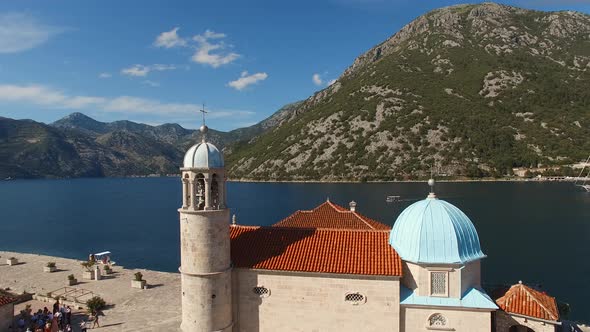 Drone View of the Bell Tower and the Roof of the Church of Our Lady on the Rocks