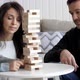 Family Is Playing in Wooden Tower at Home - VideoHive Item for Sale