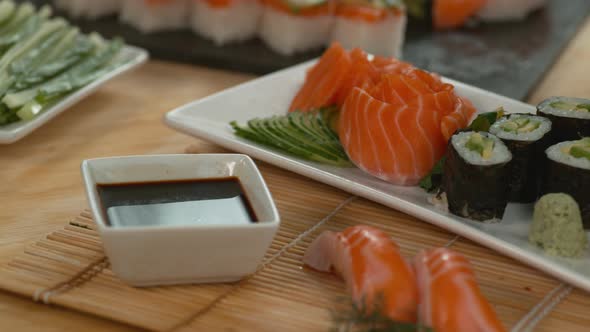 Dipping sushi into soy sauce in super slow motion, shot with Phantom Flex 4K