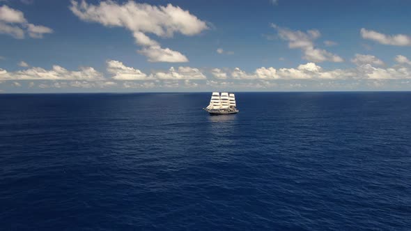 Sailing ship in the open ocean. Travel. Freedom.  Aerial 4k.