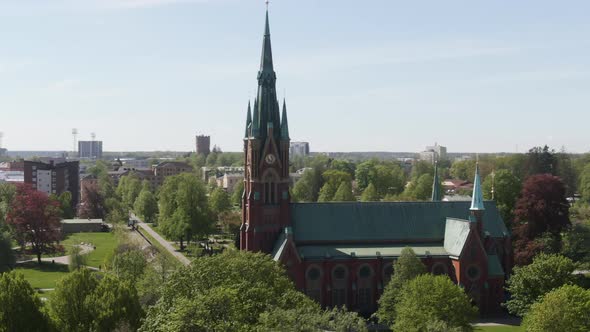 Orbital shot of St Matteus kyrka protestant church facade in norrköping Sweden