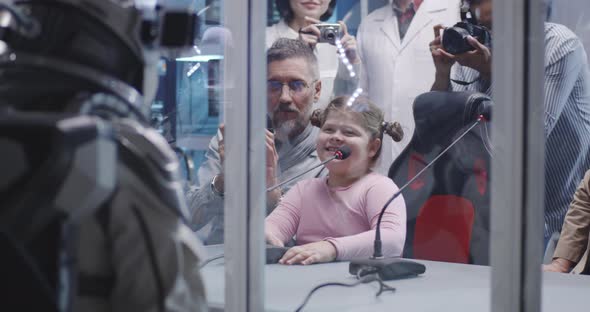 Girl Talking with Astronaut at Press Conference