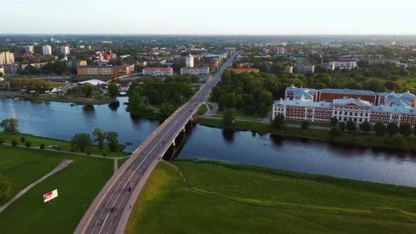 Aerial View of Jelgava City Panorama and Lielupe River in Latvia, Zemgale at Sunset 4K Dron Shot alt