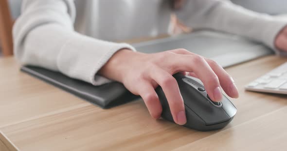 Woman working on laptop computer