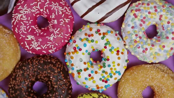 Assorted Donuts with Different Fillings and Icing