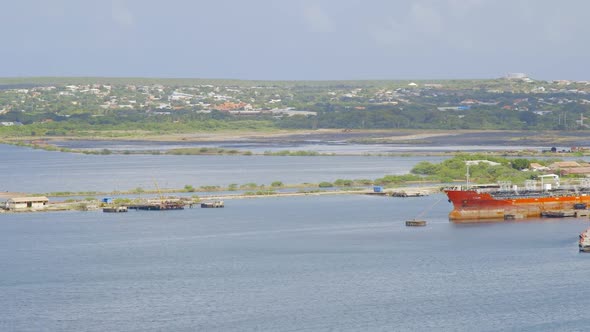 Large commercial ships docked in the asphalt lakes of Willemstad on the Caribbean island of Curacao.
