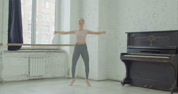 Graceful Ballet Dancer Performing Allegro Exercise