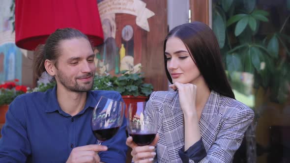 Couple Drinking Wine On Date At Restaurant, People With Drink