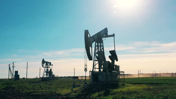 Functioning Oil Pumpjacks in a Large Oil Field