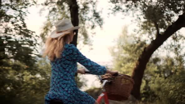 Female Cycling On Bike. Cyclist Happy Woman On Bicycle. Hair Blowing When Girl Cycling. Fun Sport.