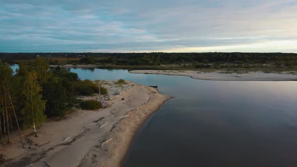 The Gauja River Flows Into the Baltic Sea Gulf of Riga Aerial 4K Shot