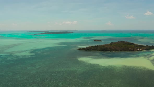 Tropical Islands with Beaches in the Blue Sea Balabac, Palawan, Philippines alt