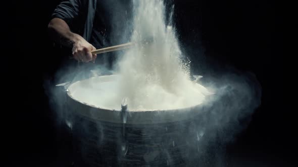 Slow Motion Drums Game on a Dusty Drum Close Up