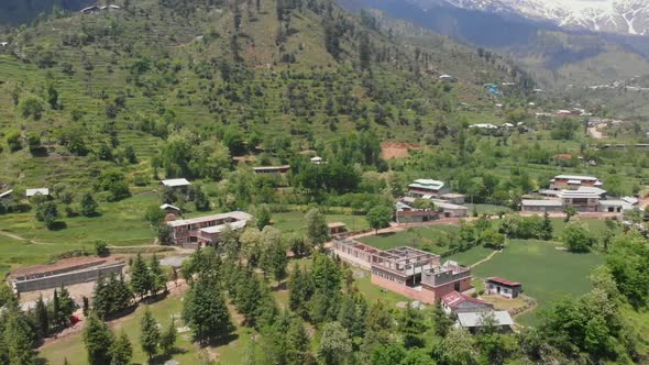 Aerial Over Swat Valley Village At Gabin Jabba In Pakistan. Dolly Out