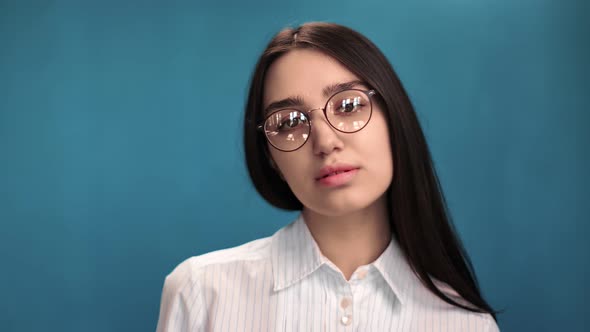 Portrait of Asian Business Woman in Glasses Posing Isolated