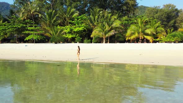 Women best friends on beautiful island beach trip by blue ocean with bright sand background of Koh P