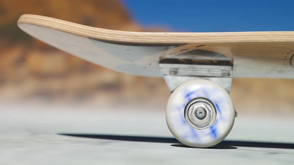 Skateboard ride on a dry field during sunny weather. Teenage sports activity 4K