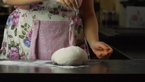 Sprinkle Flour On Dough