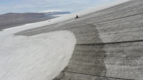 Snowmobiling On Langjökull Glacier In Iceland - drone shot