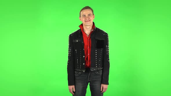 Man Smiling While Looking at Camera. Green Screen