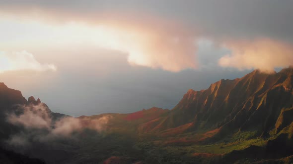 Aerial video over magnificent valley between beautiful green slopes in Waimea Canyon, Kauai, Hawaii