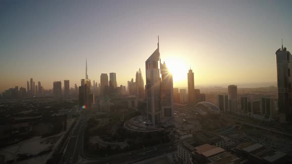 Aerial view of Dubai skyline at sunset, United Arab Emirates.